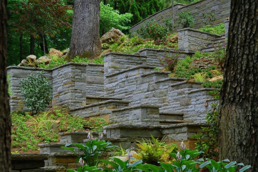 This backyard has a plethora of steps leading up the steep hillside. This backyard has a plethora of steps leading up the steep hillside.