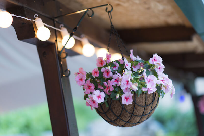 Adding a strand of hanging lights to the top of a patio or pergola is a great way to ensure that your relaxation area remains well lit into the night. Adding a strand of hanging lights to the top of a patio or pergola is a great way to ensure that your relaxation area remains well lit into the night.