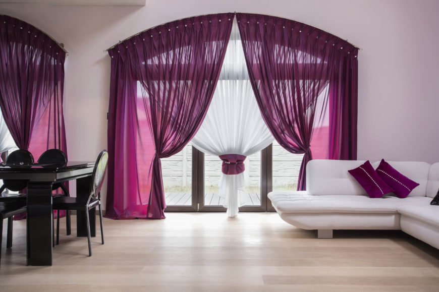 This room is a super simple and pretty color design. The rich purples along with the monochrome of the rest of the room makes a very planned and intentional look. It is very clean and makes an impact. This room is a super simple and pretty color design. The rich purples along with the monochrome of the rest of the room makes a very planned and intentional look. It is very clean and makes an impact.