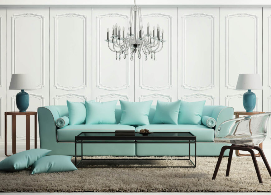 A sofa and lamps stand out in this mostly white room. A sofa is a great place to add color and a great deal depth and appeal. A sofa and lamps stand out in this mostly white room. A sofa is a great place to add color and a great deal depth and appeal.