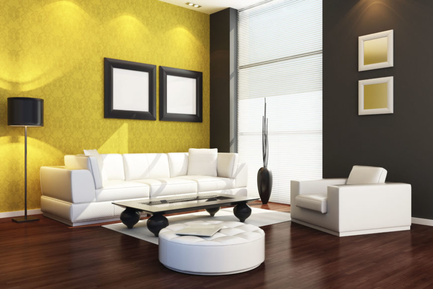 Stark white furnishings are backed by black and yellow walls. This is a bold and interesting color scheme that has a great deal of visual appeal. Stark white furnishings are backed by black and yellow walls. This is a bold and interesting color scheme that has a great deal of visual appeal.