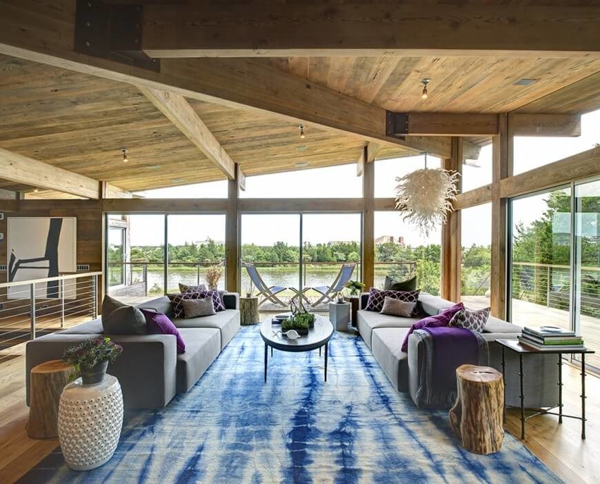 This room sides on the cooler shades. The grays work well with the cool blues and purples. The natural wood colors of the ceiling and the floor show that the wood tones can go with most any color themes. This room sides on the cooler shades. The grays work well with the cool blues and purples. The natural wood colors of the ceiling and the floor show that the wood tones can go with most any color themes.