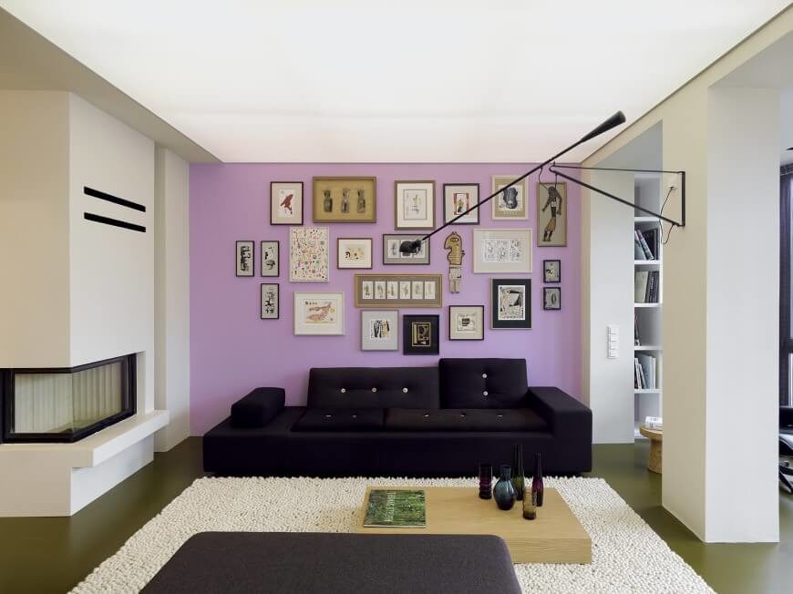 A single accent wall can add a great deal of visual interest to a room. The pale purple wall brings some brightness and life to a mostly monochrome design. A single accent wall can add a great deal of visual interest to a room. The pale purple wall brings some brightness and life to a mostly monochrome design.