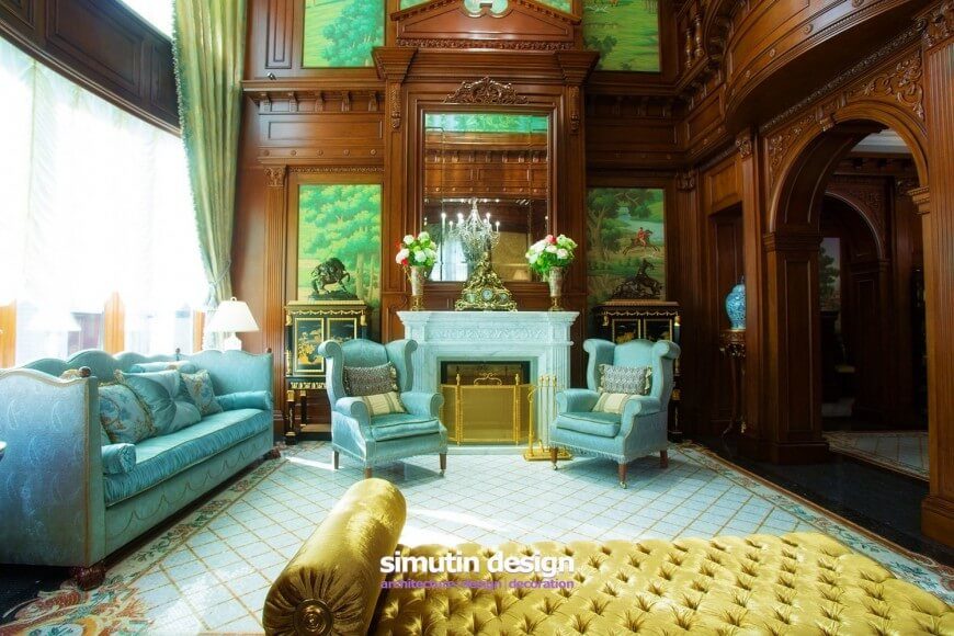 This living room uses a combination of blue, yellow and green on a backdrop of ornate natural wood walls to create an elegant and lavish look. This living room uses a combination of blue, yellow and green on a backdrop of ornate natural wood walls to create an elegant and lavish look.