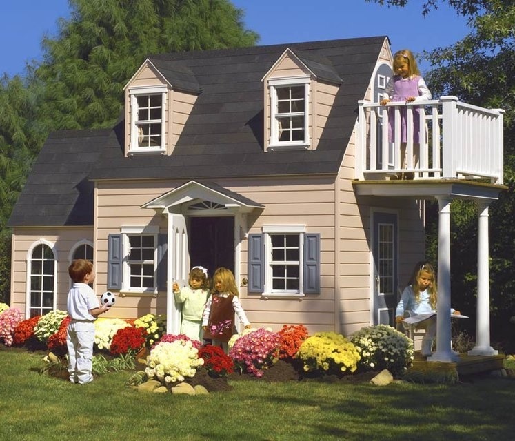 Colorful mums surround this incredible playhouse. Consider adding interesting details like painted shutters and a balcony to your child's playhouse. Colorful mums surround this incredible playhouse. Consider adding interesting details like painted shutters and a balcony to your child's playhouse.