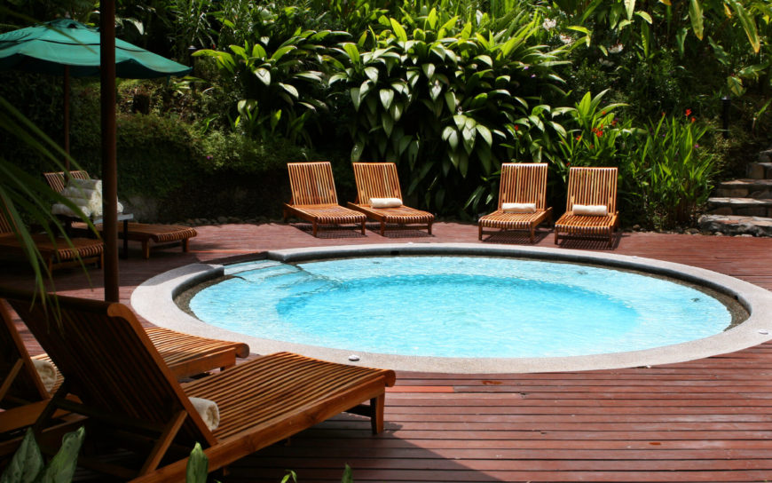 An in-ground hot tub, like a swimming pool, is a great place to arrange patio furniture around. Climbing in and out of this hot tub is easy, and you don't have to be away from your friends and family when you want to take a soak. An in-ground hot tub, like a swimming pool, is a great place to arrange patio furniture around. Climbing in and out of this hot tub is easy, and you don't have to be away from your friends and family when you want to take a soak.