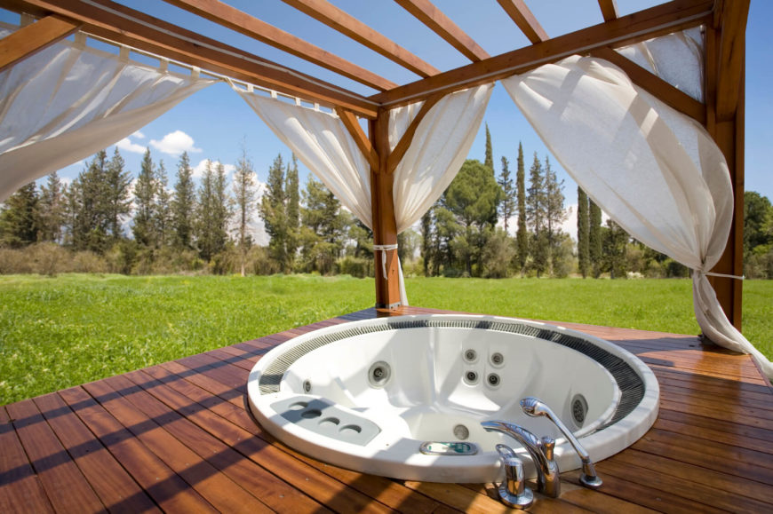 Building a structure such as this around a hot tub lets the occupants enjoy their surroundings when they want to. Closing the shades allows you to make this hot tub a private and secluded spot. The best of both worlds. Building a structure such as this around a hot tub lets the occupants enjoy their surroundings when they want to. Closing the shades allows you to make this hot tub a private and secluded spot. The best of both worlds.