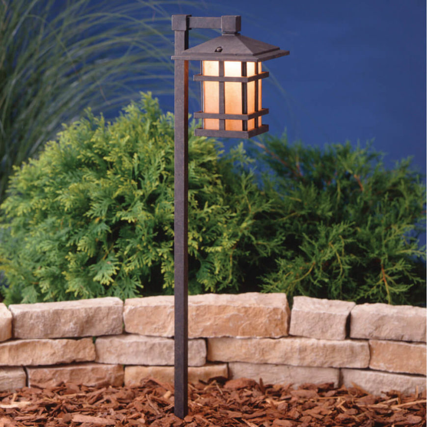 Lanterns are a great way to provide light to a garden. This lantern has a nice iron look that brings an old English charm to your garden.