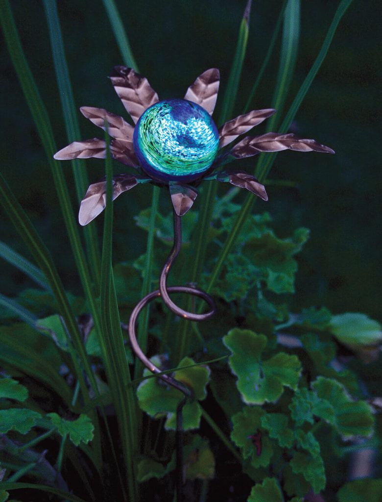 Here is an amazing piece. During the day, this piece looks like artwork - a colorful element to spice up your garden. But this piece also glows in the dark, working at night to make sure that your garden goes unscathed