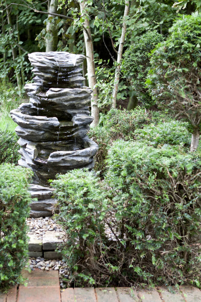 This sculpture was designed to be part of a water feature and to emulate a natural occurrence as much as possible. Not all sculptures are designed to stand out, some, such as this one, are designed to blend in and look natural. This sculpture was designed to be part of a water feature and to emulate a natural occurrence as much as possible. Not all sculptures are designed to stand out, some, such as this one, are designed to blend in and look natural.