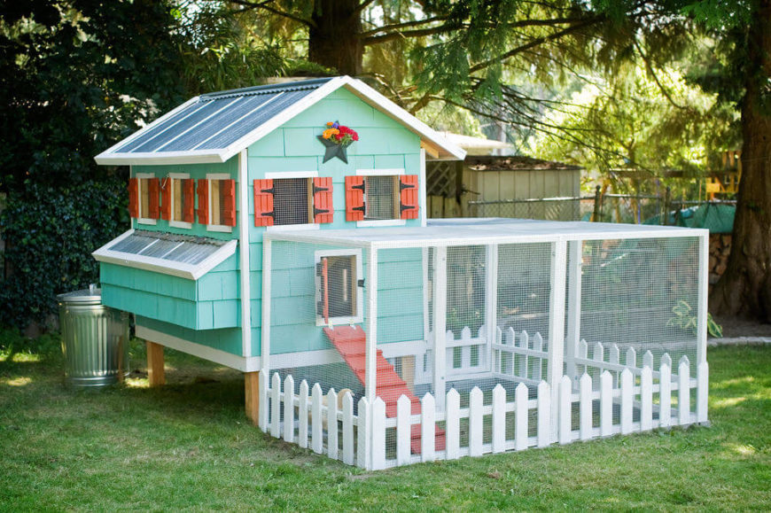 Here's another beautiful DIY chicken coop design, sporting a multicolored paint job and a rather large outdoor exercise area. The white picket fence is the adorable detail that ties it all together. Here's another beautiful DIY chicken coop design, sporting a multicolored paint job and a rather large outdoor exercise area. The white picket fence is the adorable detail that ties it all together.