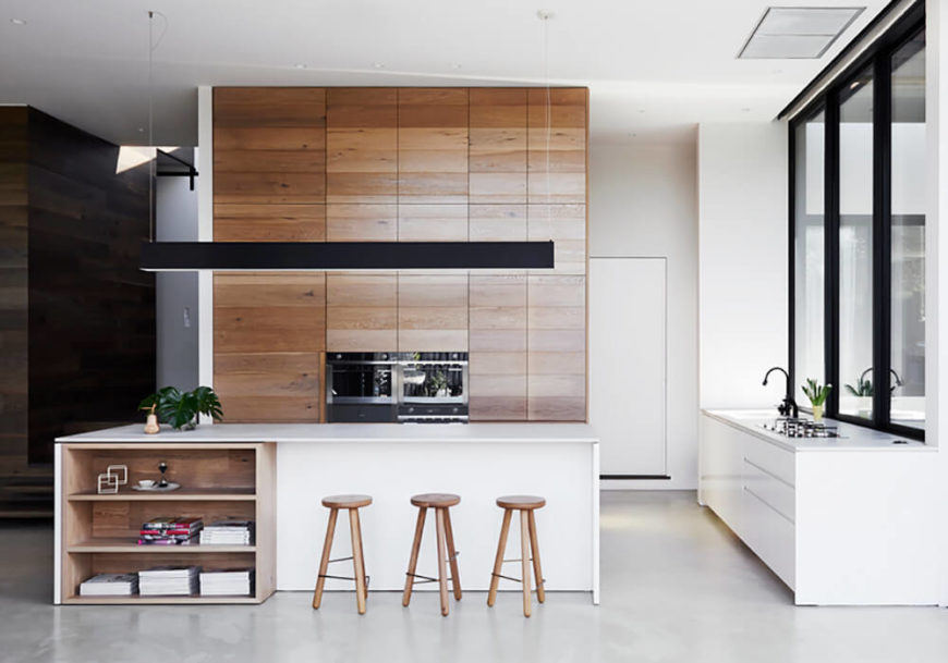 Wood and Brick Walls Bring This Modern Interior To Life