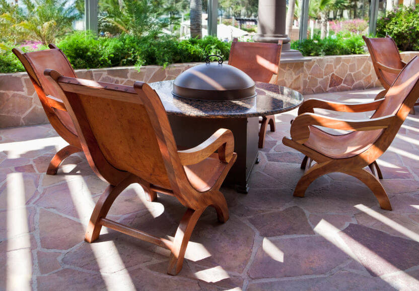 Gas powered patio fire pit elevated on square base with round table where the fire pit is situated in the centre. This is perfect for providing both fire and a small table for drinks or eating. Gas powered patio fire pit table elevated on square base with round table where the fire pit is situated in the centre. This is perfect for providing both fire and a small table for drinks or eating.