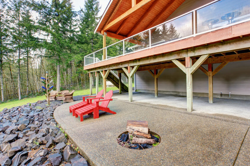 Interesting patio where the fire pit hole was cut directly in to the patio. Interesting patio where the fire pit hole was cut directly in to the patio.