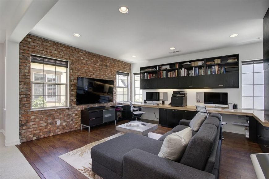 A brick wall is an industrial feature that looks great in family rooms, regardless of if you have young children or older children. A brick wall is an industrial feature that looks great in family rooms, regardless of if you have young children or older children.