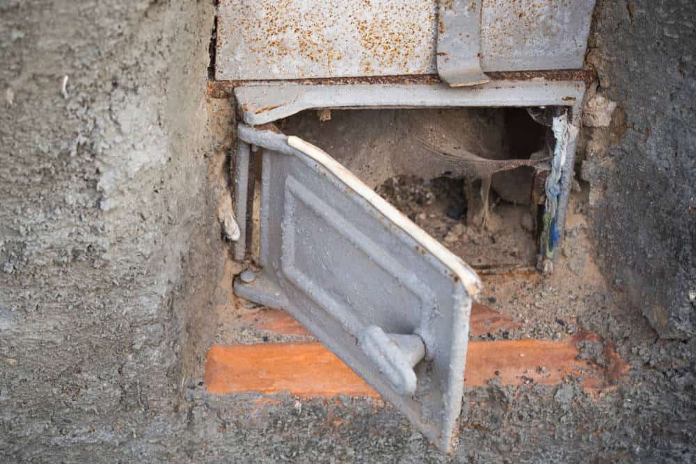 Wood stove access for traditional wood-burning sauna