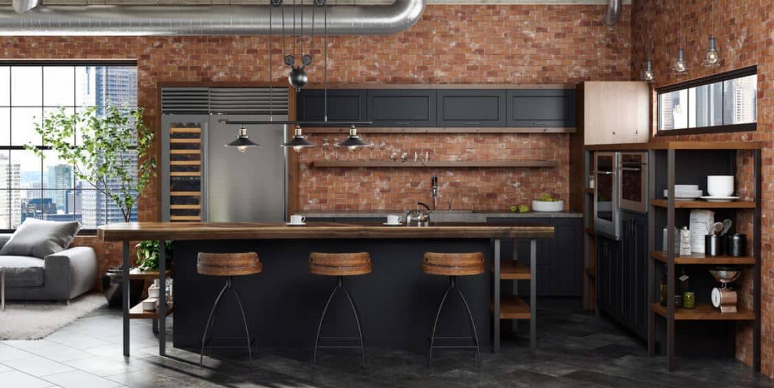This industrial-style kitchen has a charming combination of red brick walls, black shaker cabinets and drawers and wooden elements of the countertops and shelves. This is given a nice background of gray flooring tiles and brilliant wide window.